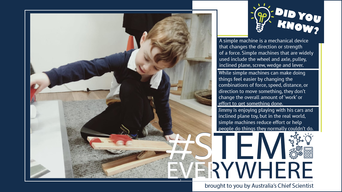 Boy playing with toy ramp
