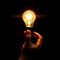 lightbulb illuminating the dark