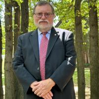 Portrait of Professor Tony Haymet standing outdoors 