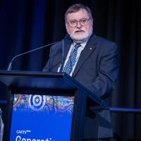 Prof Tony Haymet standing at lectern