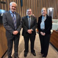 Prof Tony Haymet stands with Dr Josep 'Pep' Canadell and Her Excellency Esther Monterrubio Villar